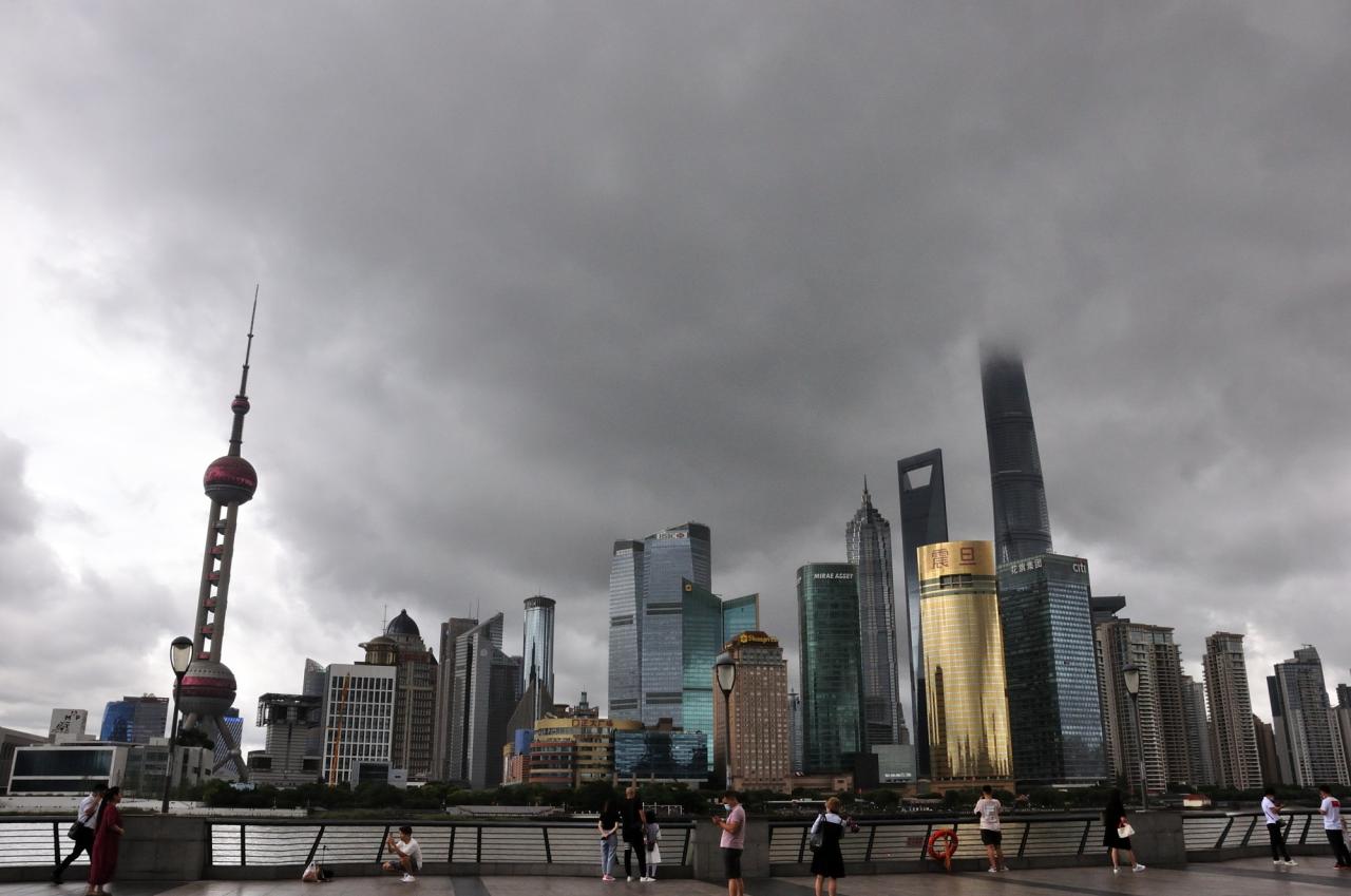 A typhoon hits shanghai and the chinese economy groans