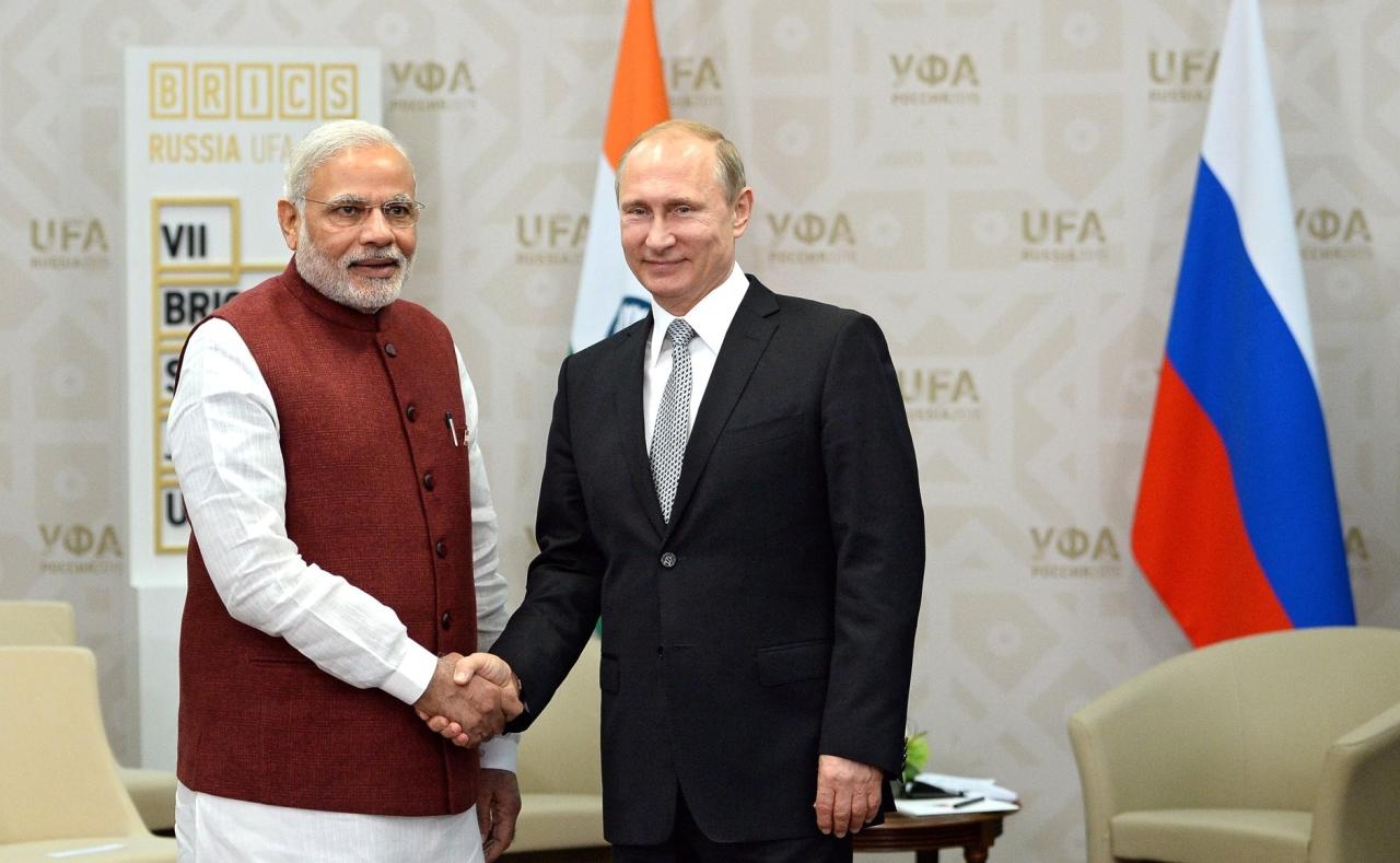 Narendra modi cuddles up to vladimir putin in moscow