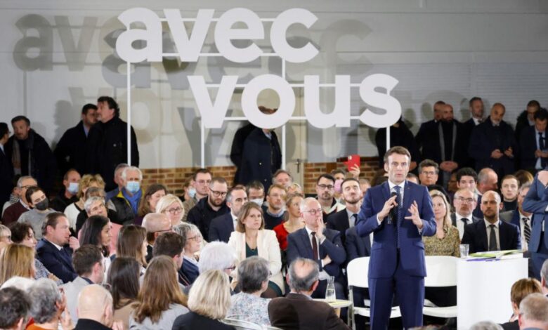 Macron emmanuel political campaign meeting positions heavy facts fast nantes applauds getty during april