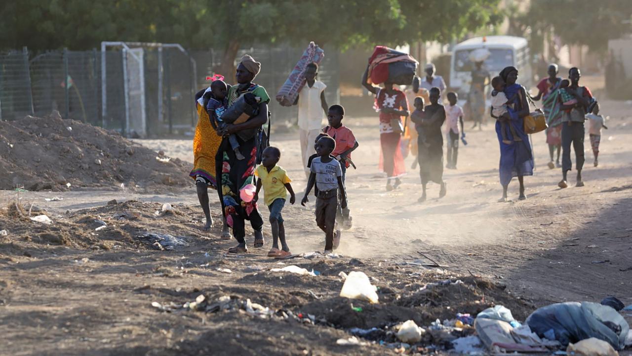 A battle rages for a key city in sudans ravaged western region