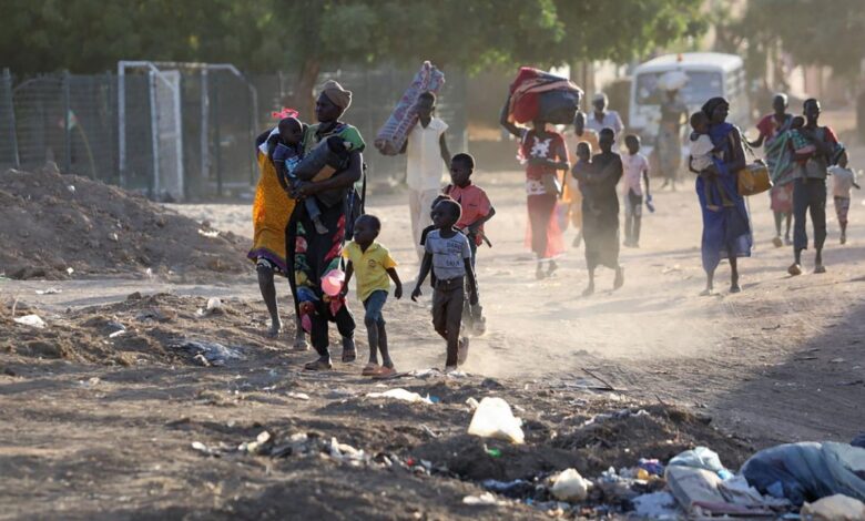A battle rages for a key city in sudans ravaged western region