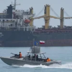 Rising Tensions as Iran Threatens to Sink US Naval Vessels in the Strait of Hormuz Amid Escalating Blockade and Failed Diplomacy