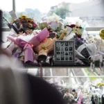 Flowers and Prayers for the Victims of the Argo Bromo Anggrek and KRL Collision at Bekasi Timur Station