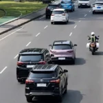 Geely EX2 Pink Ignites Debate on Strobes and Sirens Amidst Convoy Controversy