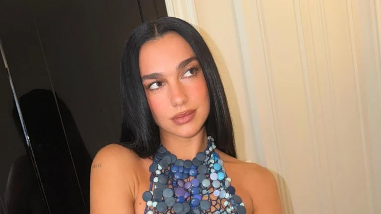 Dua Lipa Stuns in Avant-Garde Halter Top Crafted from Hundreds of Buttons and High-End Luxury Timepiece