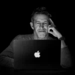 Apple Reintroduces the Iconic Glowing Logo on the New Touchscreen MacBook Pro as a Blend of Nostalgia and Cutting-Edge Innovation