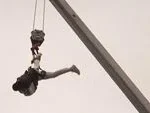 Daring Houdini II Escapes Straight-Jacket Hanging 27 Meters Above Hollywood in Centennial Tribute to the Legendary Illusionist