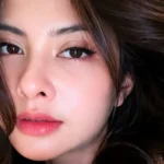 Transforming Beauty Standards at 40: Former T2 Member Tiwi Debuts Stunning Transformation One Month Post-Plastic Surgery in South Korea