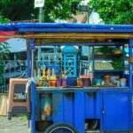 Unraveling the Mystery Behind the Iconic Colors of Indonesian Street Food Carts